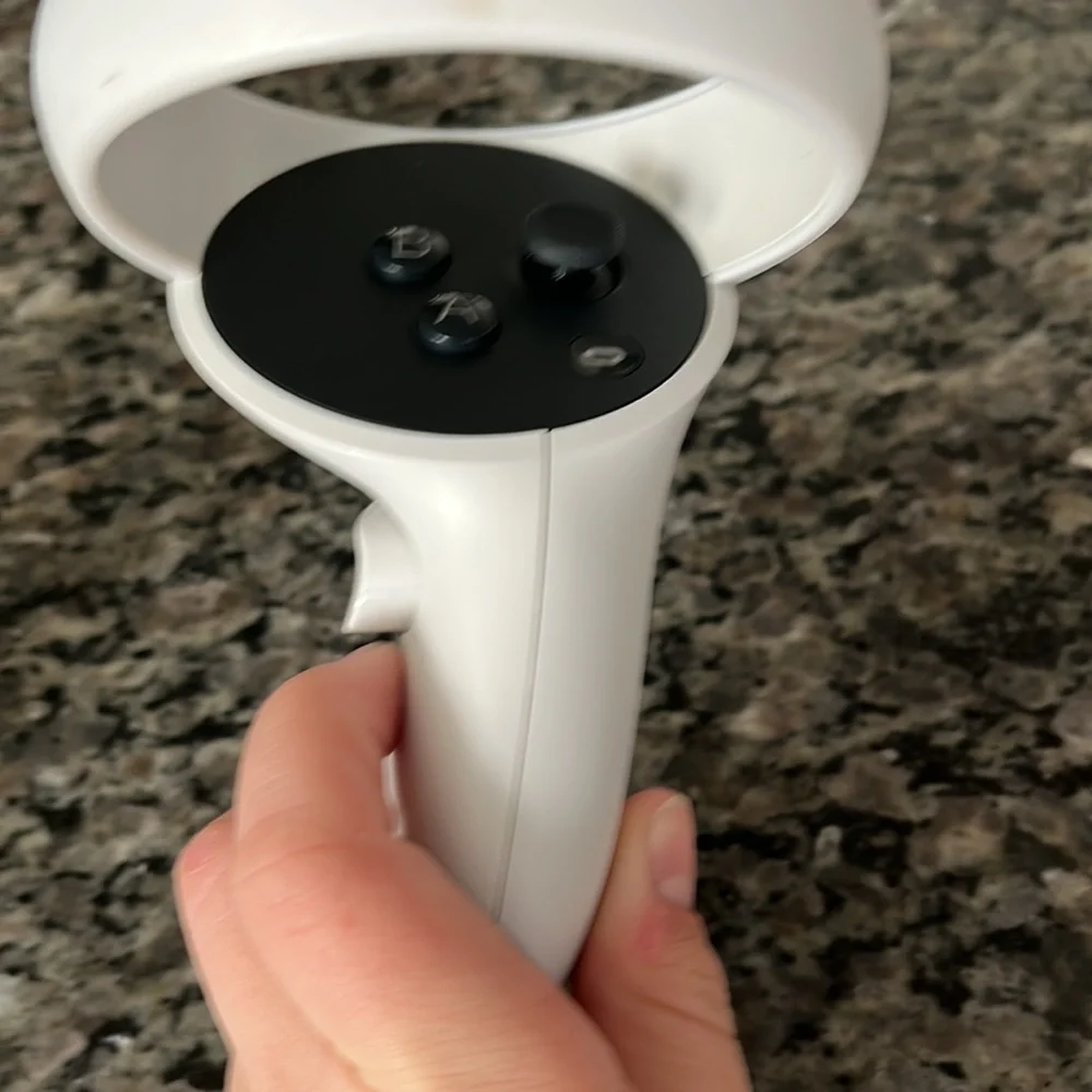 Oculus quest 2 64g, got some scratches and scrapes on controller but perfect